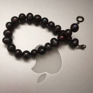 Pacific black pearl bracelet in 13black pearls .